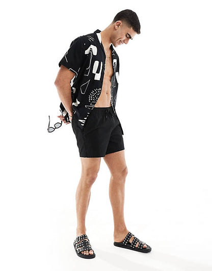 Relaxed revere shirt with line drawing abstract print in black